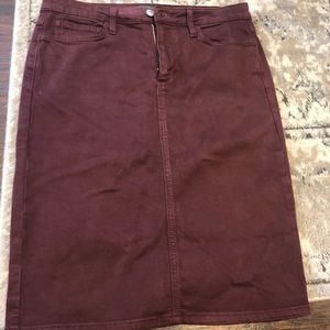 Maroon/rust coloured denim skirt.